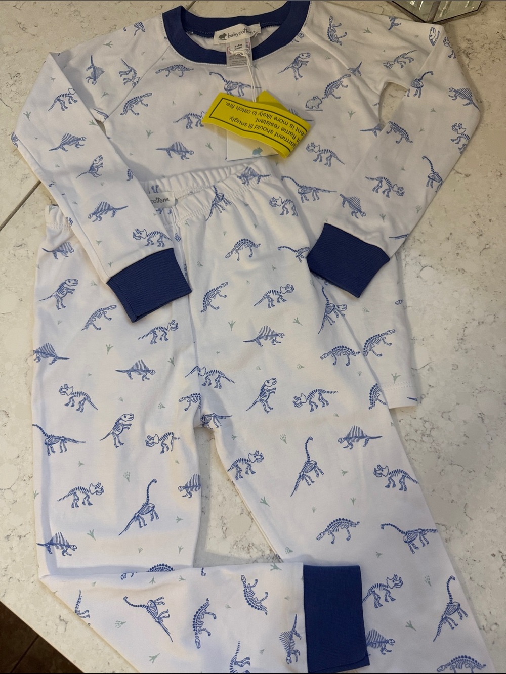 babycottons White Pajama Set with Blue Dino Print and Navy Trim